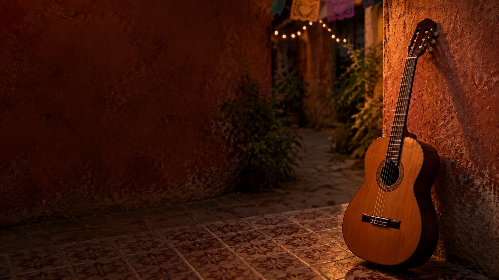 An acoustic guitar resting against a warm terracotta wall in a Guanajuato alleyway, with papel picado and string lights overhead.